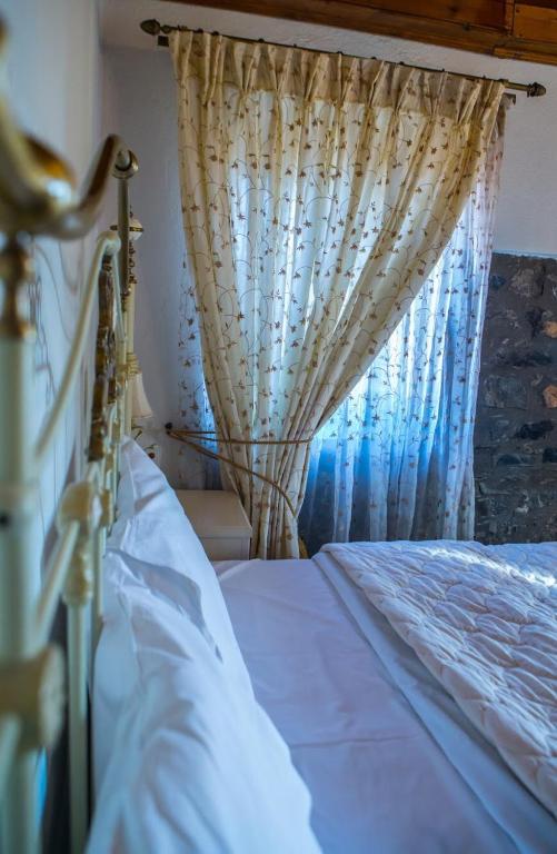Posteľ alebo postele v izbe v ubytovaní Guesthouse Tsegani