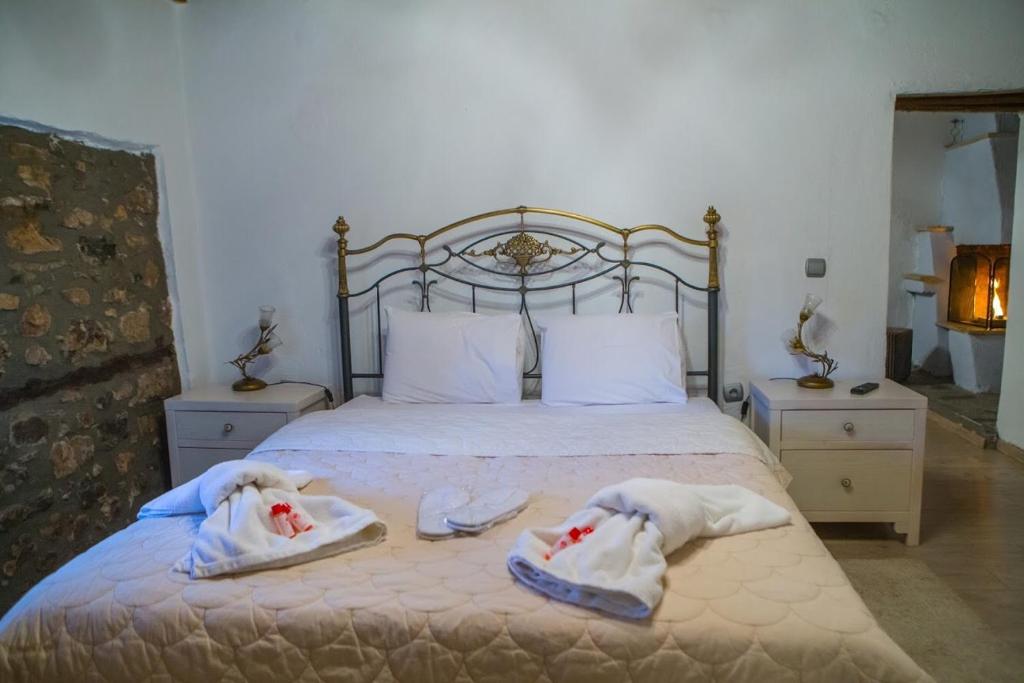 Posteľ alebo postele v izbe v ubytovaní Guesthouse Tsegani