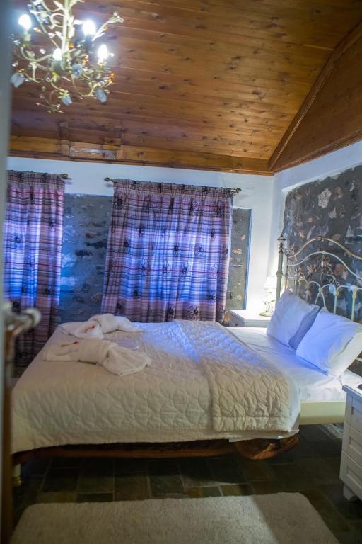 Posteľ alebo postele v izbe v ubytovaní Guesthouse Tsegani