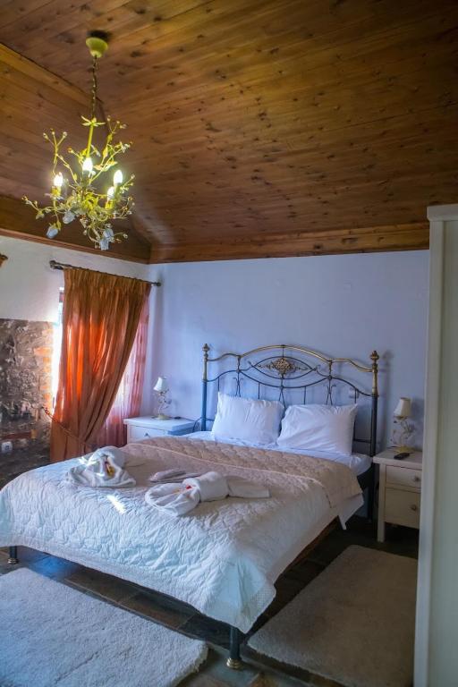 Posteľ alebo postele v izbe v ubytovaní Guesthouse Tsegani