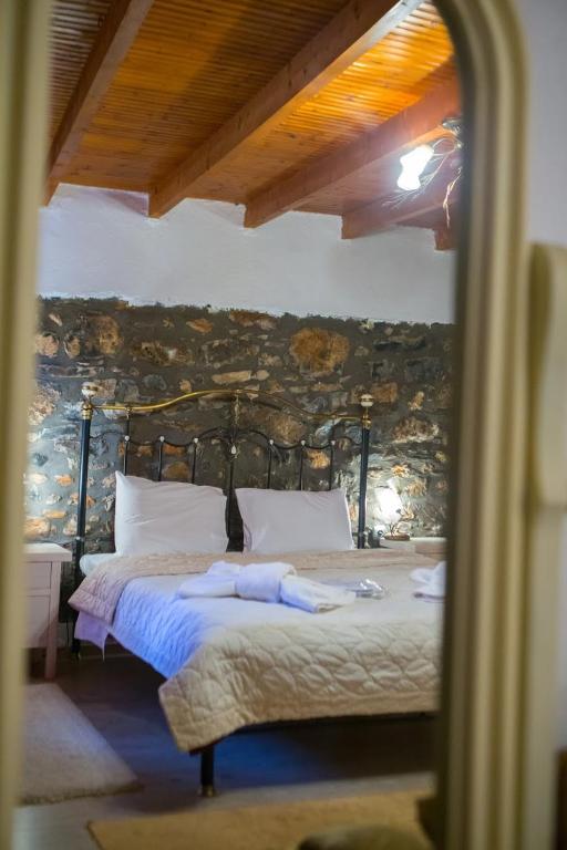 Posteľ alebo postele v izbe v ubytovaní Guesthouse Tsegani