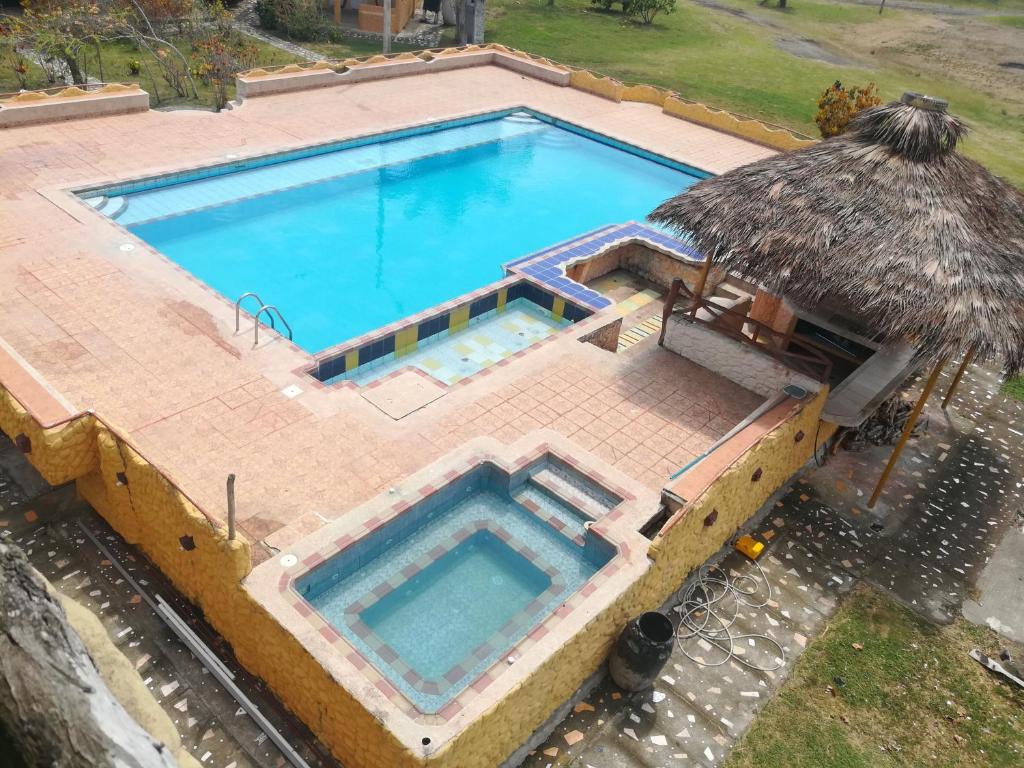 Bazén v ubytování Hosteria Mar de Plata nebo v jeho okolí