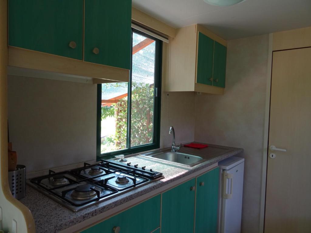 Kuchyň nebo kuchyňský kout v ubytování Agriturismo Cascina Le Volpi