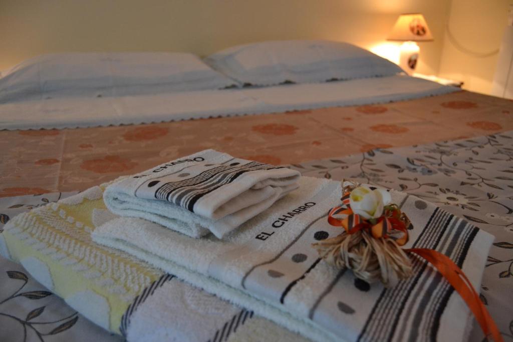 Posteľ alebo postele v izbe v ubytovaní Relax House