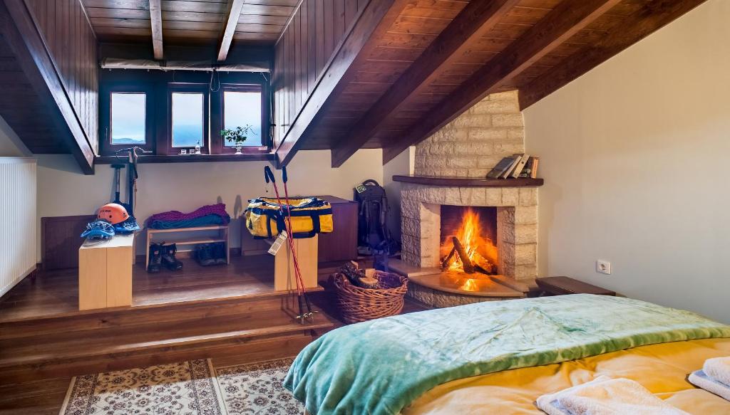 A bed or beds in a room at En Chora Vezitsa