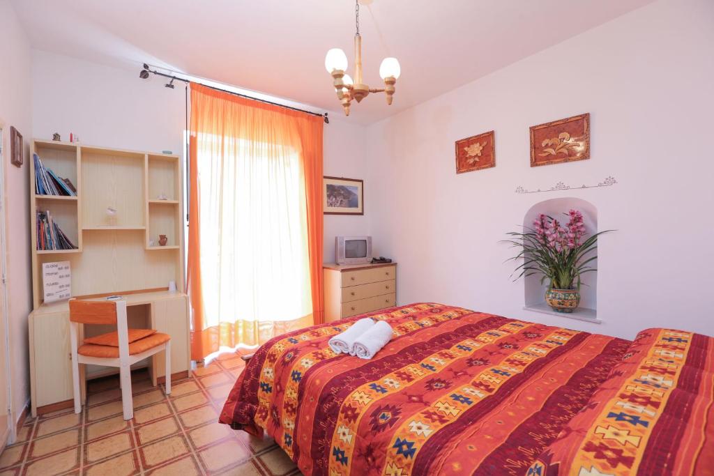 Łóżko lub łóżka w pokoju w obiekcie Villa Marietta