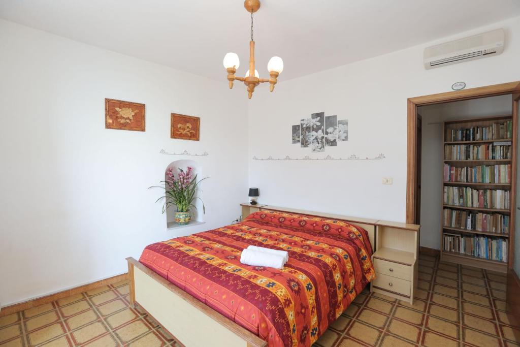 Łóżko lub łóżka w pokoju w obiekcie Villa Marietta
