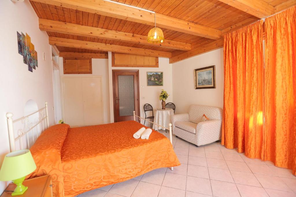 Łóżko lub łóżka w pokoju w obiekcie Villa Marietta
