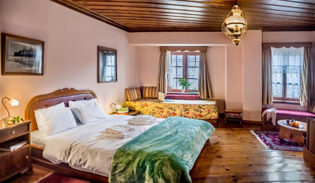 A bed or beds in a room at En Chora Vezitsa