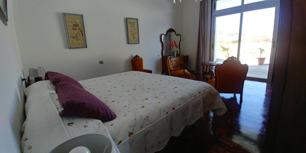 Postel nebo postele na pokoji v ubytování Casa La Caldera