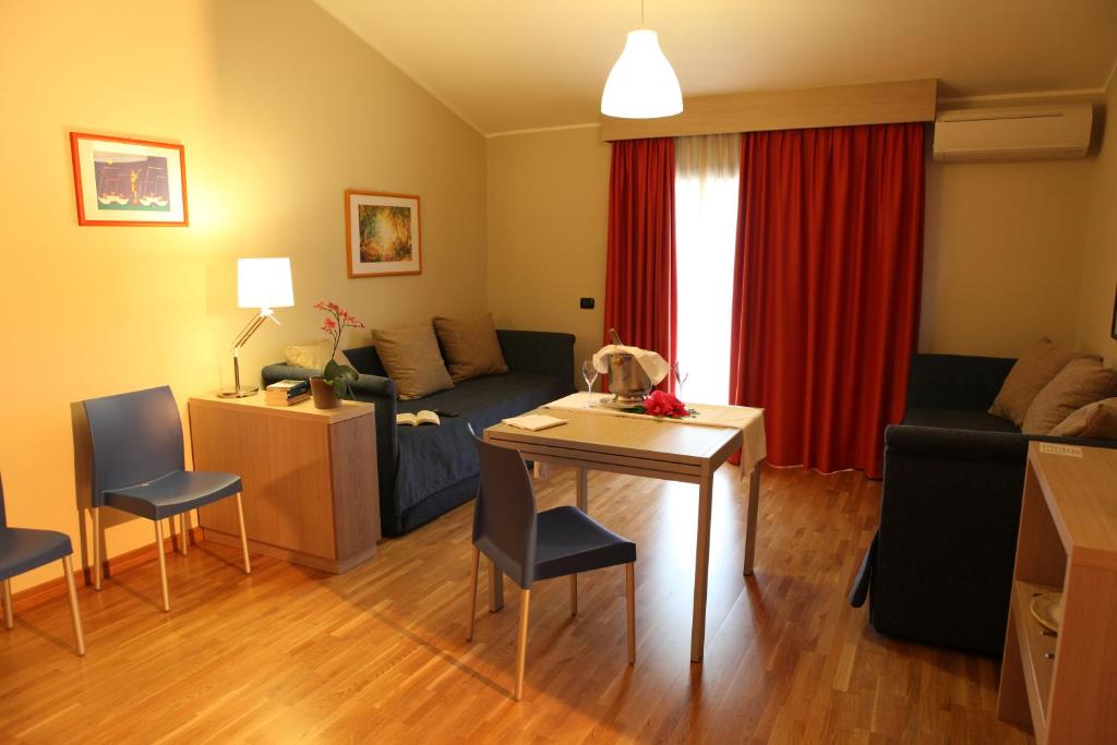 Posezení v ubytování Heraclea Hotel Residence