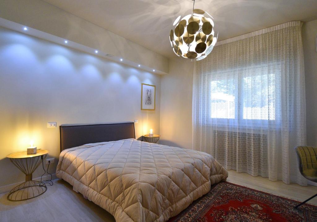 A bed or beds in a room at Parnasus