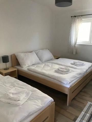 Postel nebo postele na pokoji v ubytování Miraka