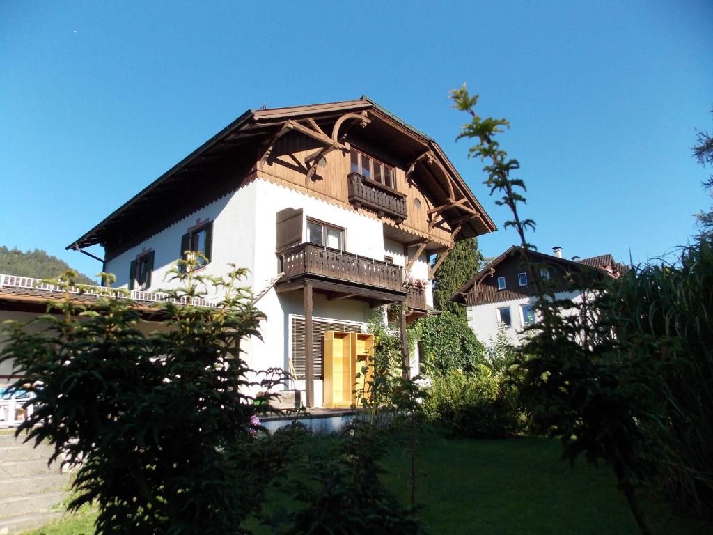 a large house with a balcony on top of it at M9 Appartment in Garmisch-Partenkirchen