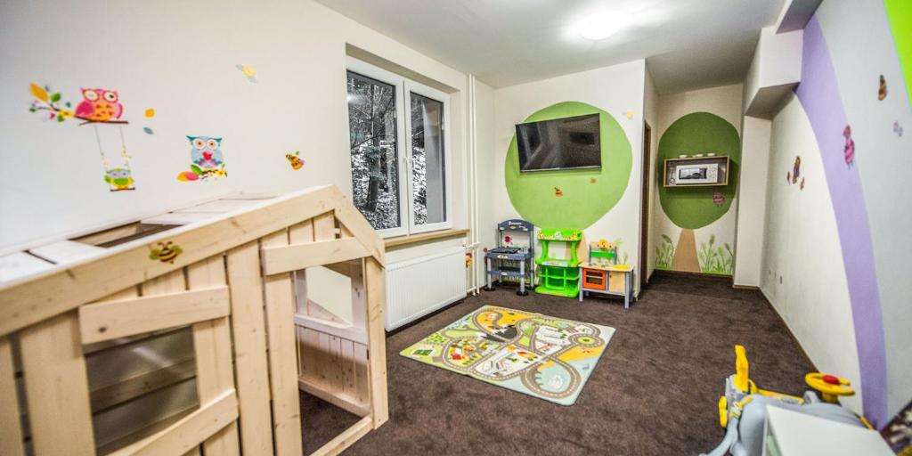 TV a/nebo společenská místnost v ubytování Riverside