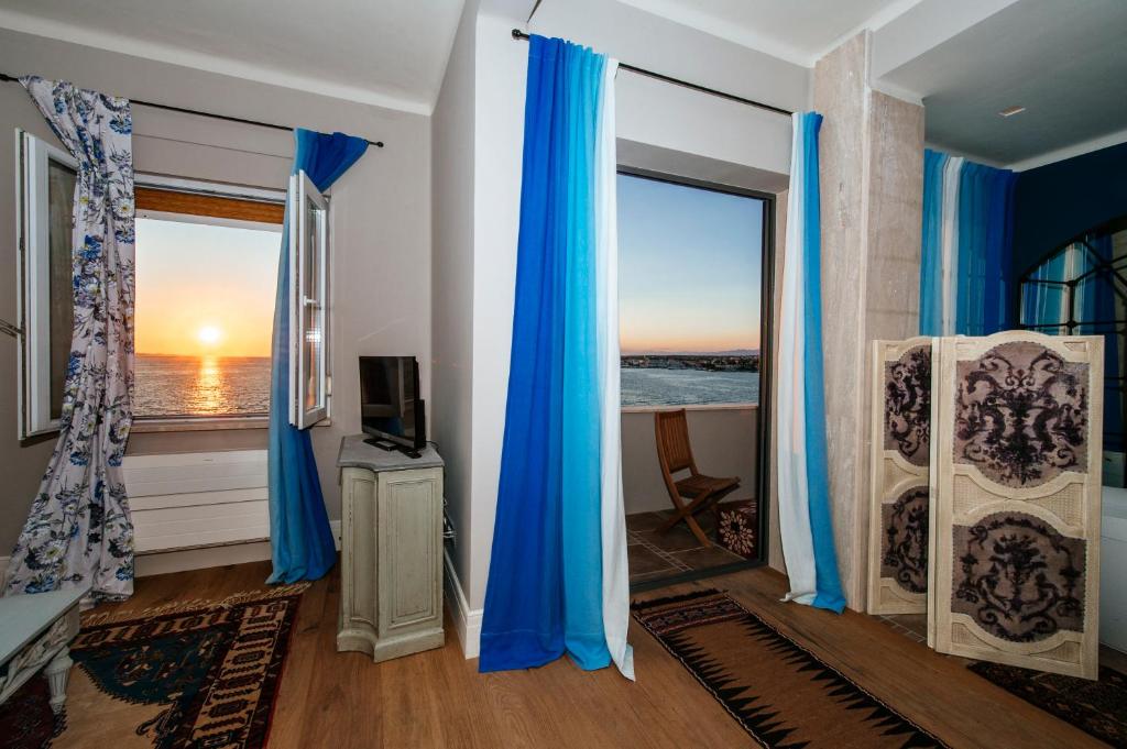 Televízia a/alebo spoločenská miestnosť v ubytovaní Luxury Residence Zadar