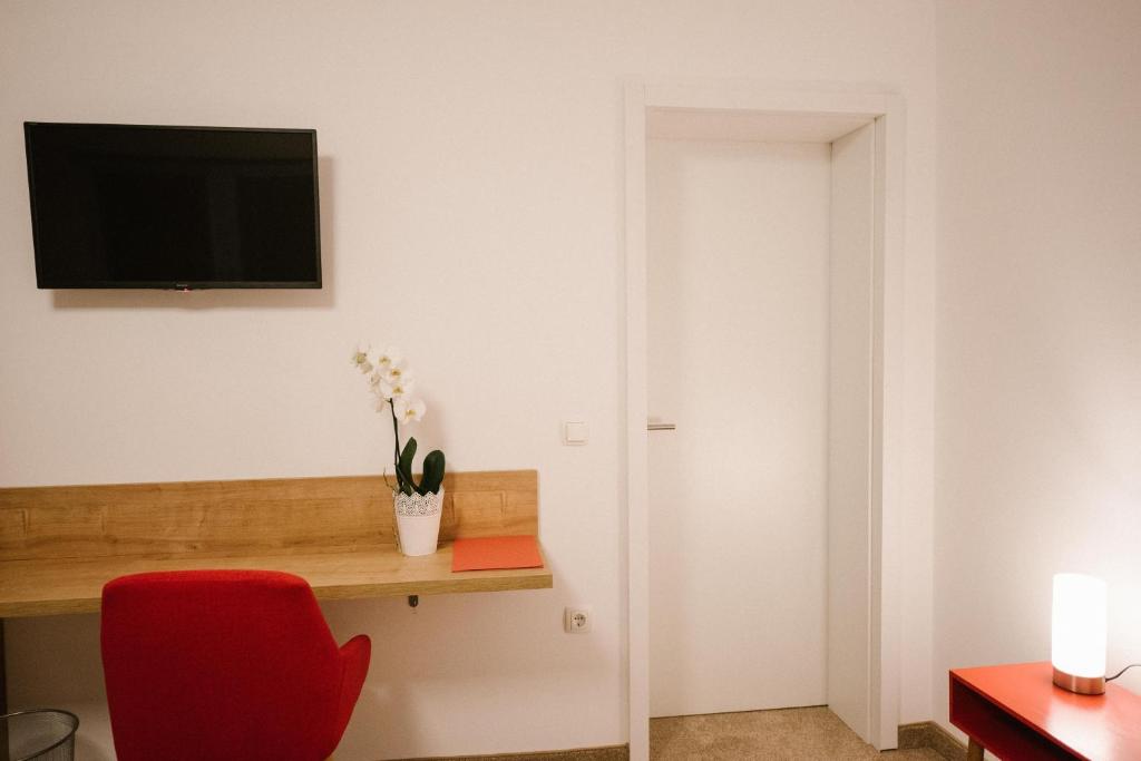 TV a/nebo společenská místnost v ubytování 2I rooms