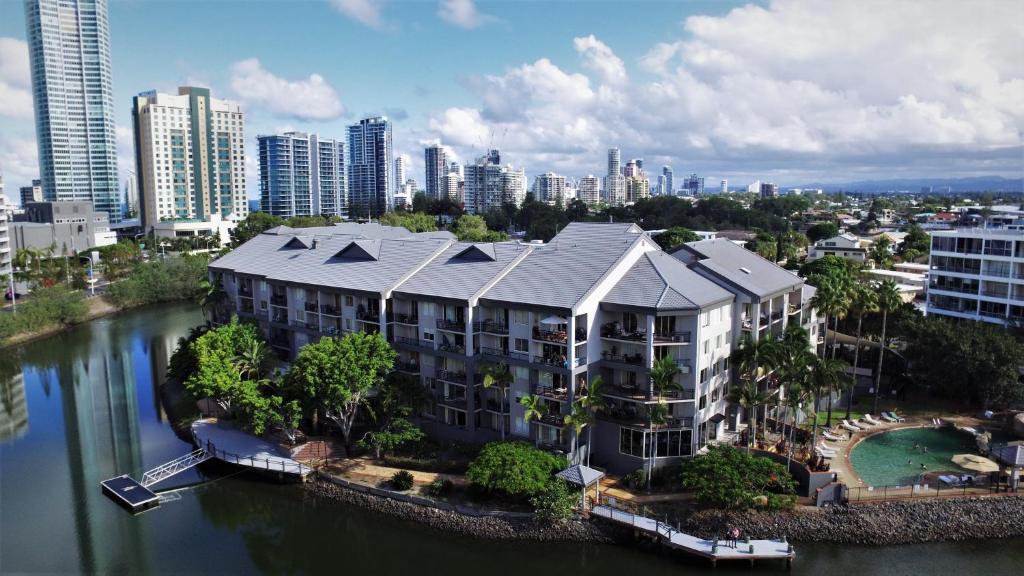 an aerial view of a building next to a river at Paradise Island Resort in Gold Coast