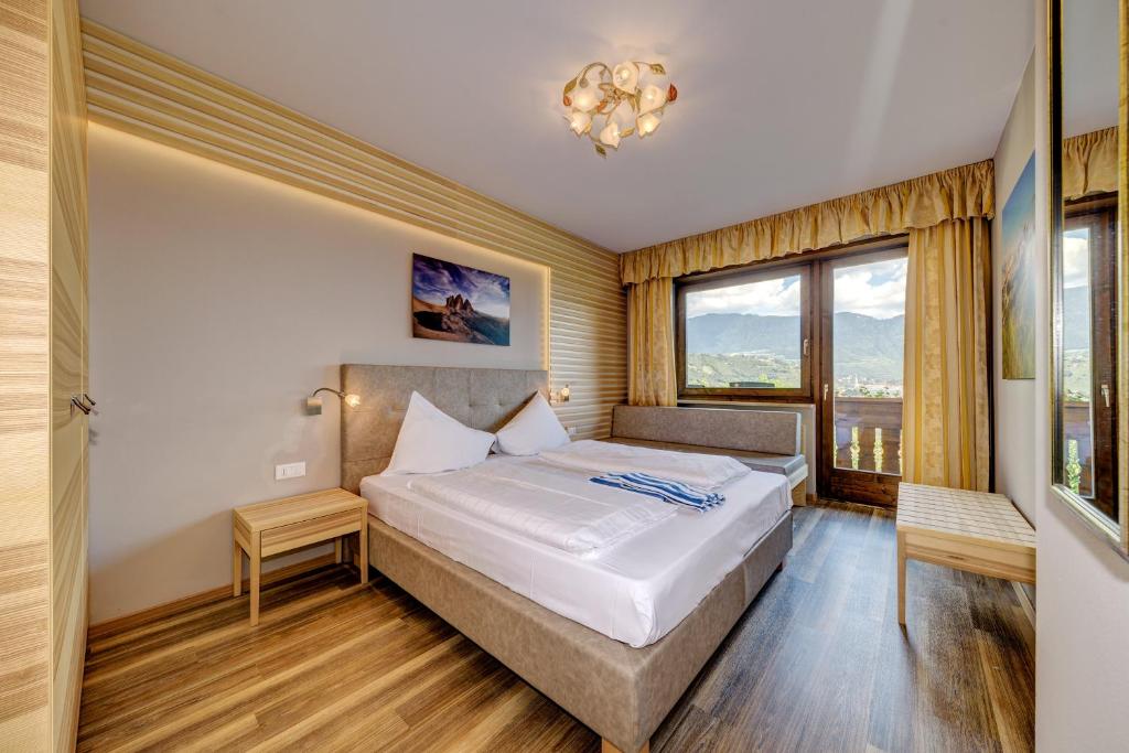 Postel nebo postele na pokoji v ubytování Ruster Resort