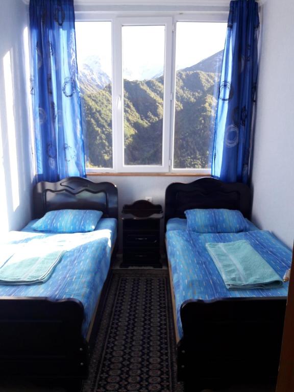 Postel nebo postele na pokoji v ubytování Betegi Guest House