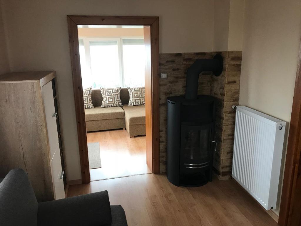 Posezení v ubytování Panoráma Apartman