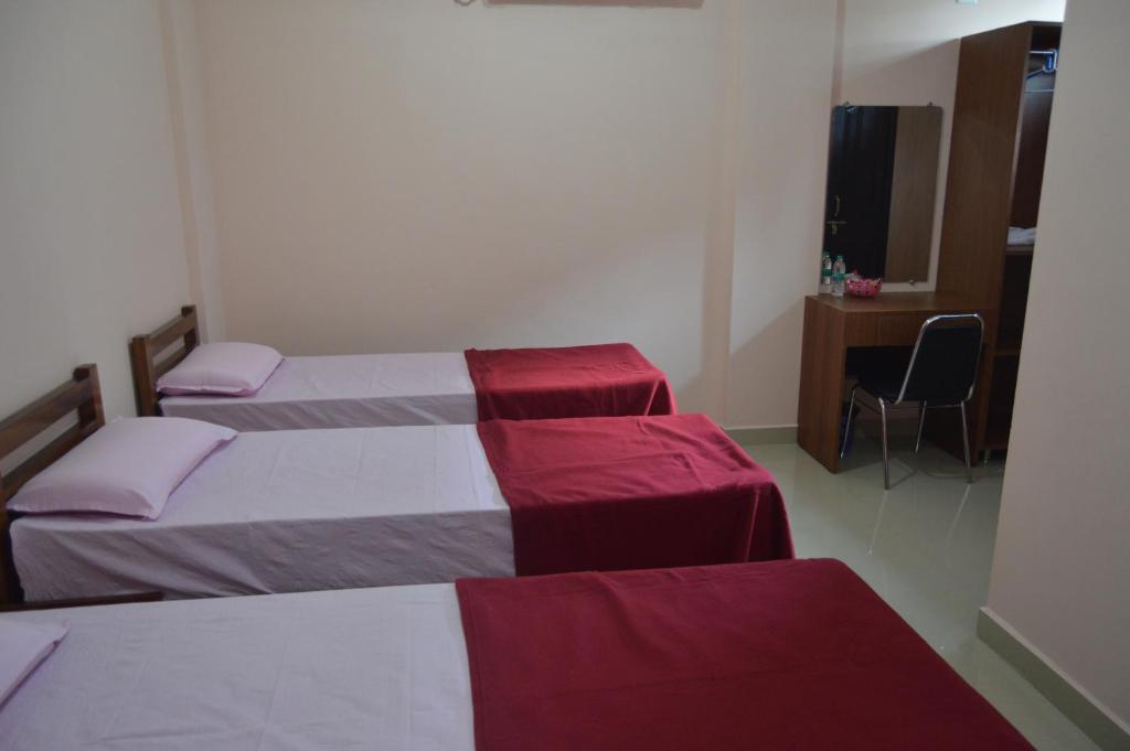 Postel nebo postele na pokoji v ubytování SUPREME LODGe