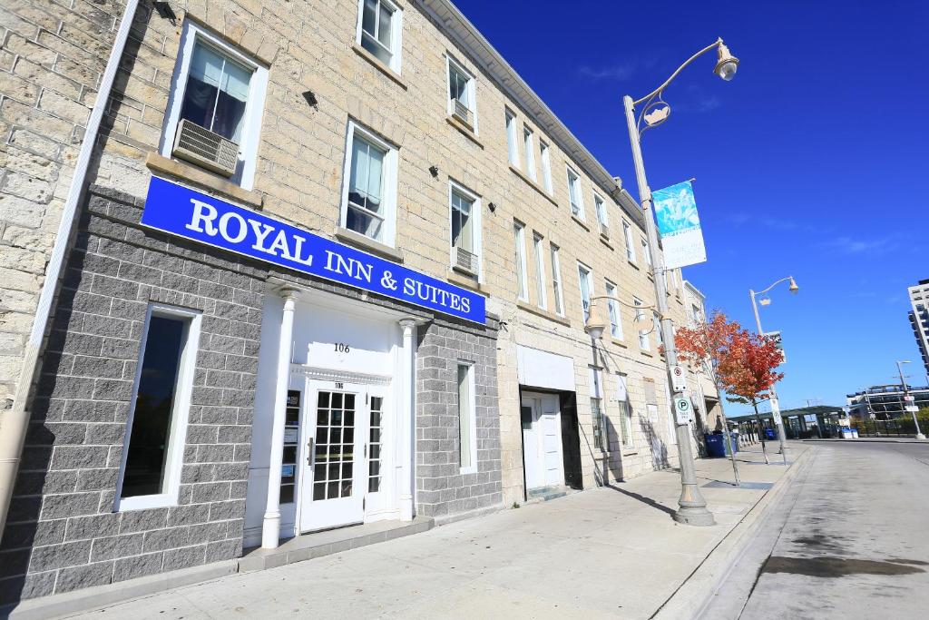 a brick building with a royal inn and suites sign on it at Royal Inn and Suites at Guelph in Guelph