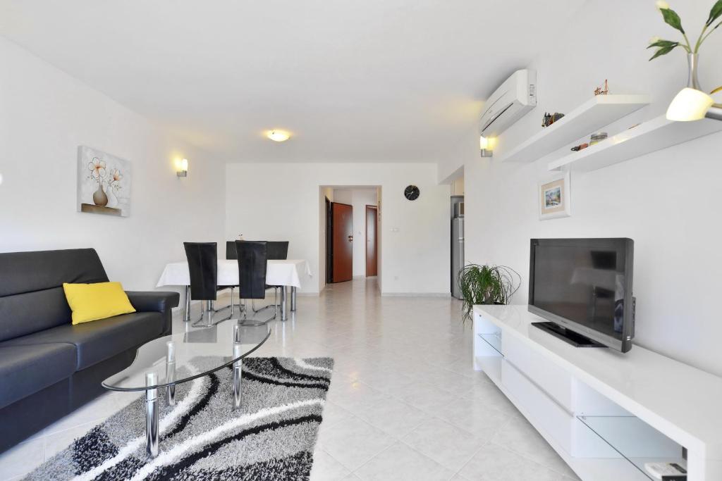 TV a/nebo společenská místnost v ubytování Villa DIVA Holiday House