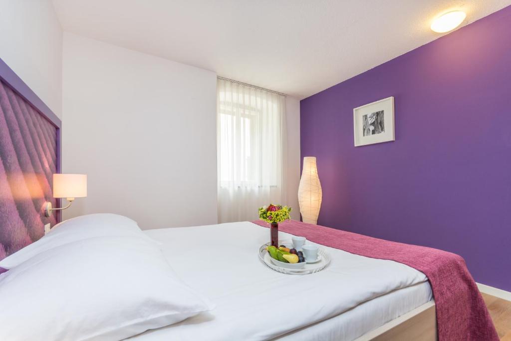 Postel nebo postele na pokoji v ubytování Hotel Vista