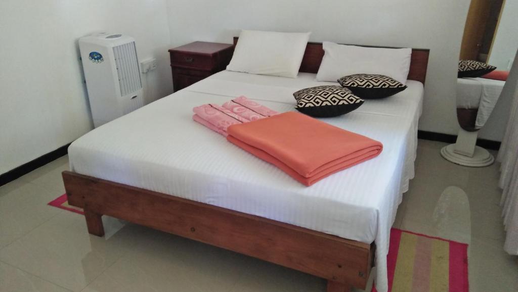 Postel nebo postele na pokoji v ubytování 59B Rest Inn Ella