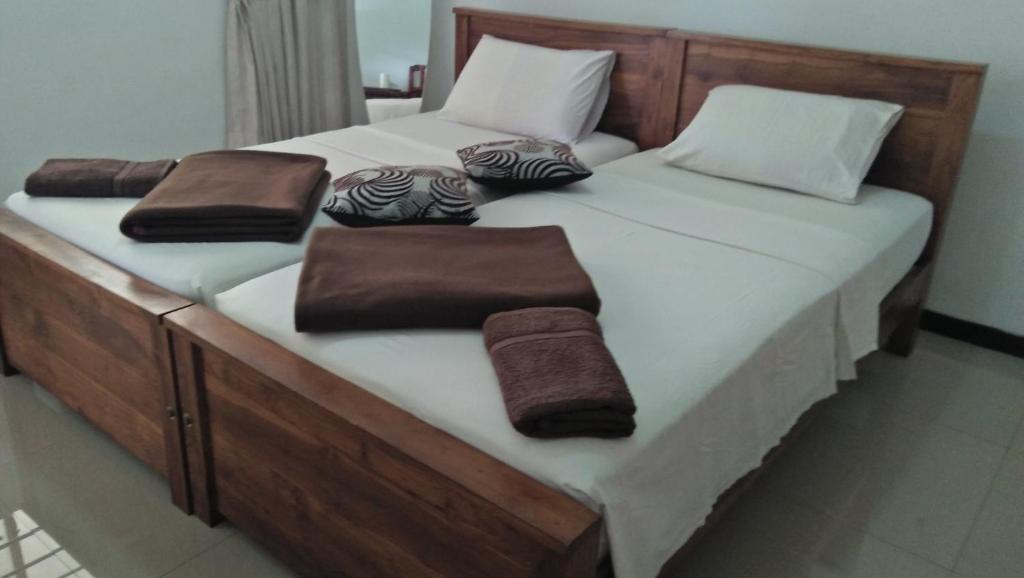 Postel nebo postele na pokoji v ubytování 59B Rest Inn Ella