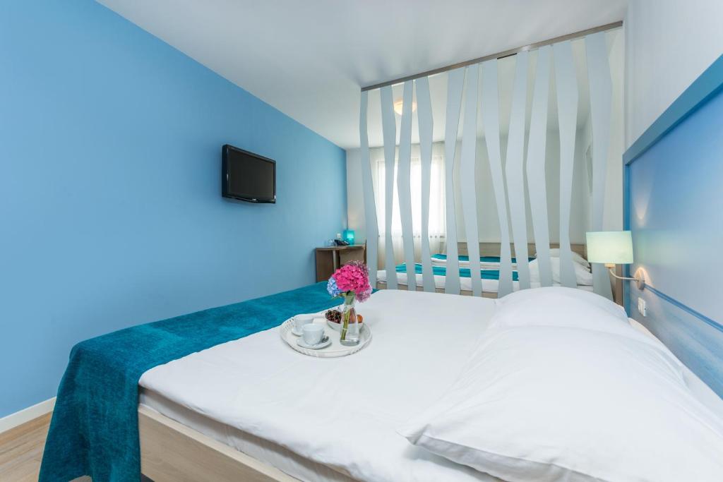 Postel nebo postele na pokoji v ubytování Hotel Vista