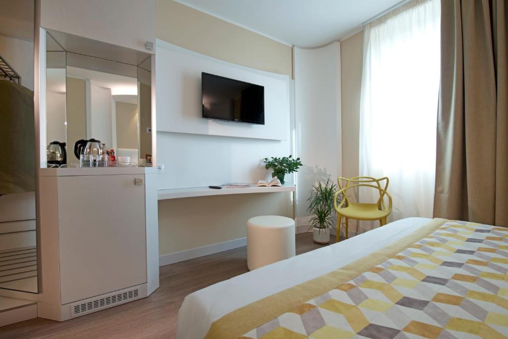 Postel nebo postele na pokoji v ubytování Ark Hotel