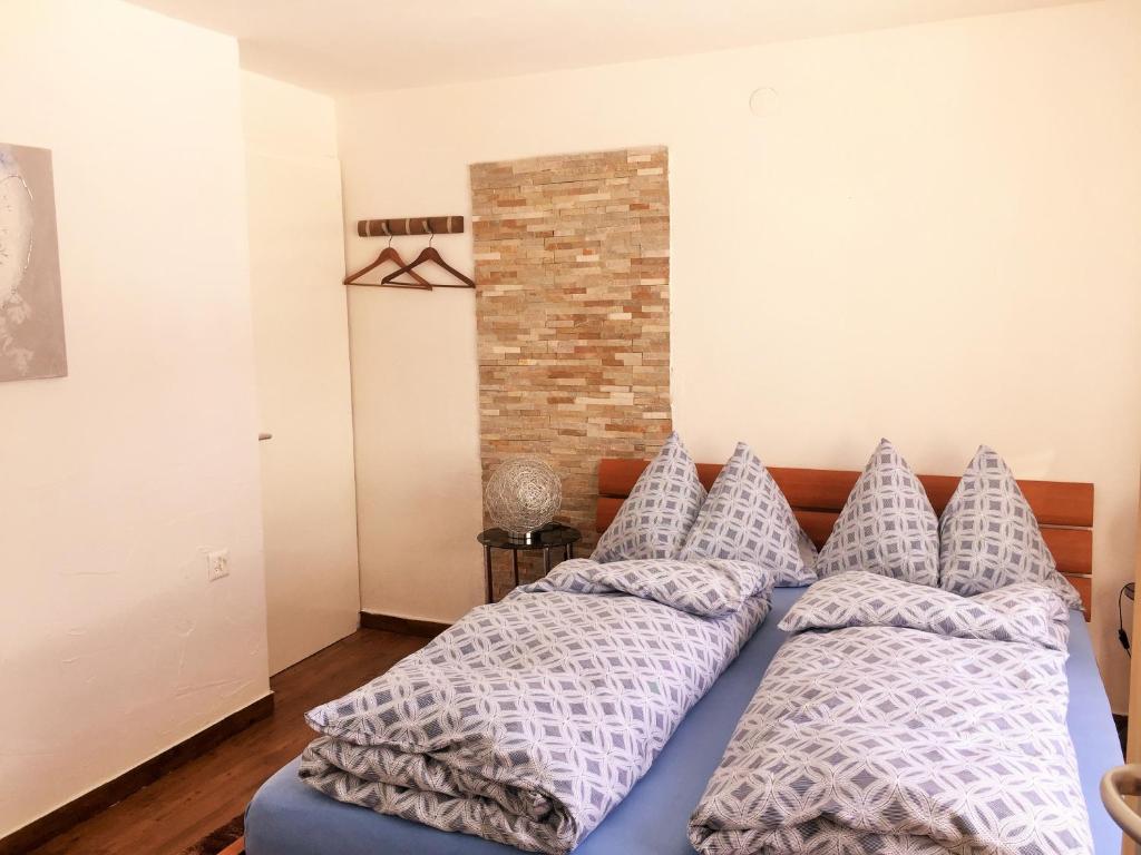 Postel nebo postele na pokoji v ubytování Apartments Steinbock