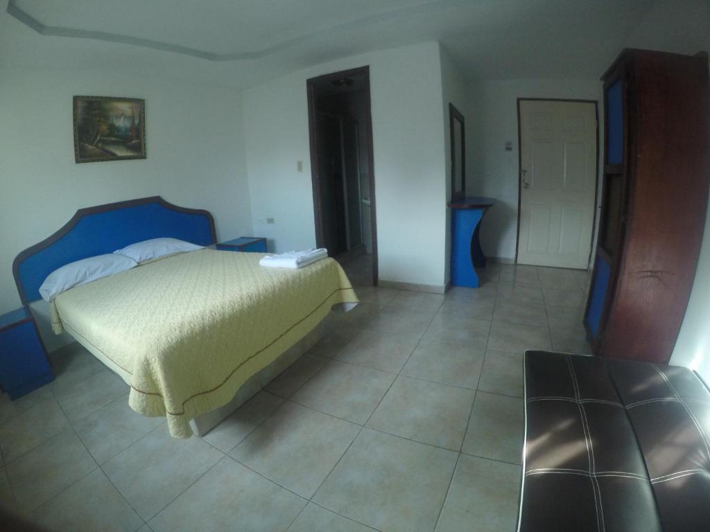 Postel nebo postele na pokoji v ubytování Backpacker Inn