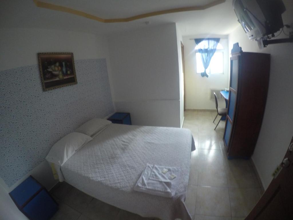 Postel nebo postele na pokoji v ubytování Backpacker Inn