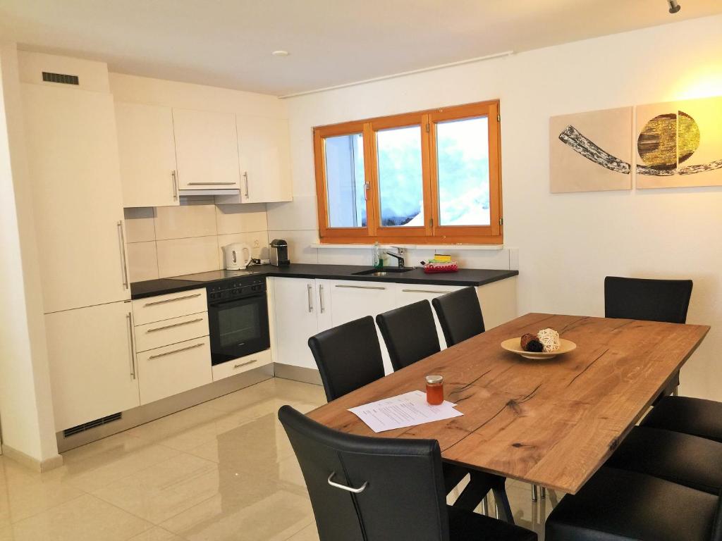 Kuchyň nebo kuchyňský kout v ubytování Apartments Soldanella