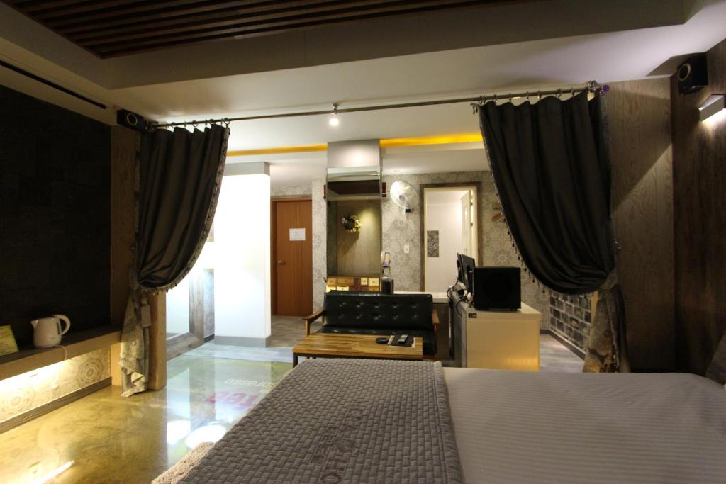 Postel nebo postele na pokoji v ubytování Hera Hotel