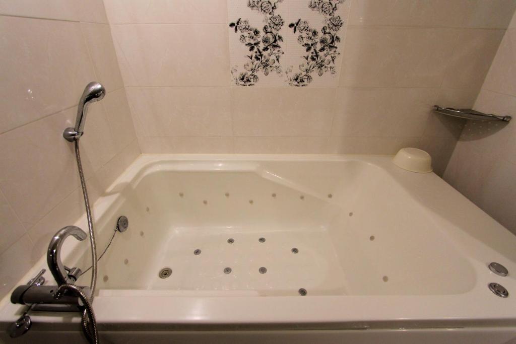 Koupelna v ubytování Hera Hotel