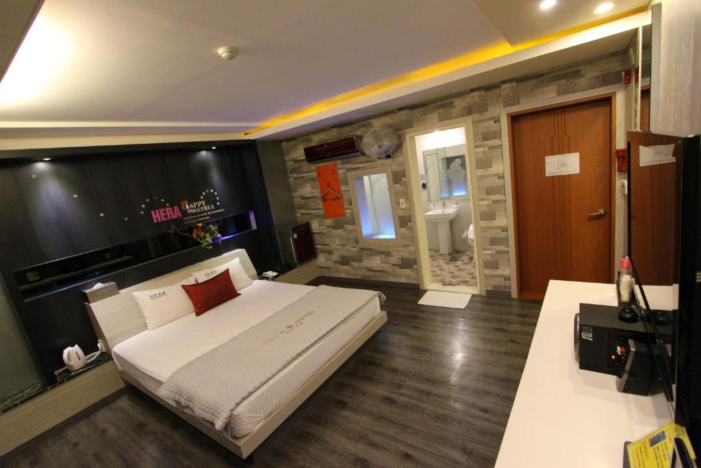 Postel nebo postele na pokoji v ubytování Hera Hotel