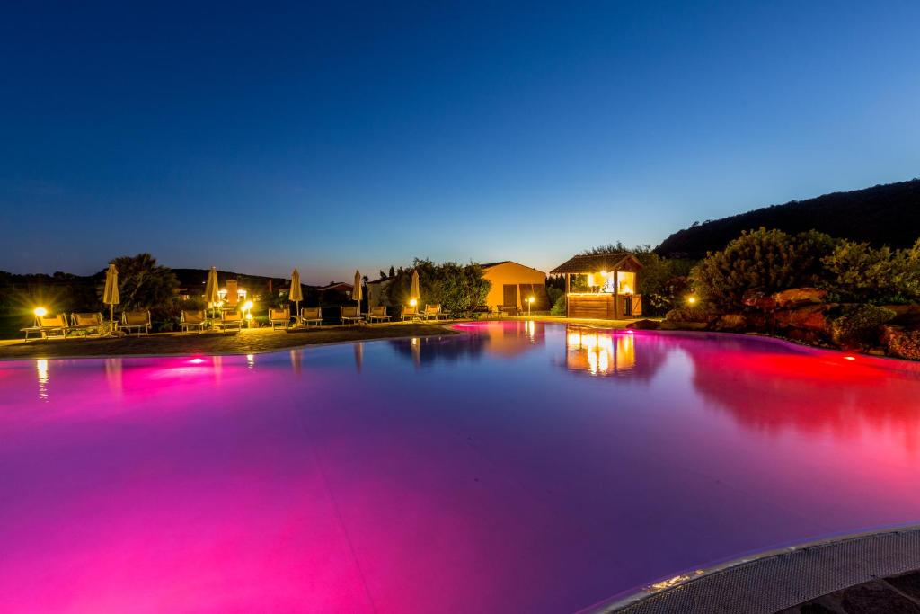 Bazén v ubytování Hotel Sa Cheya Relais & Spa nebo v jeho okolí