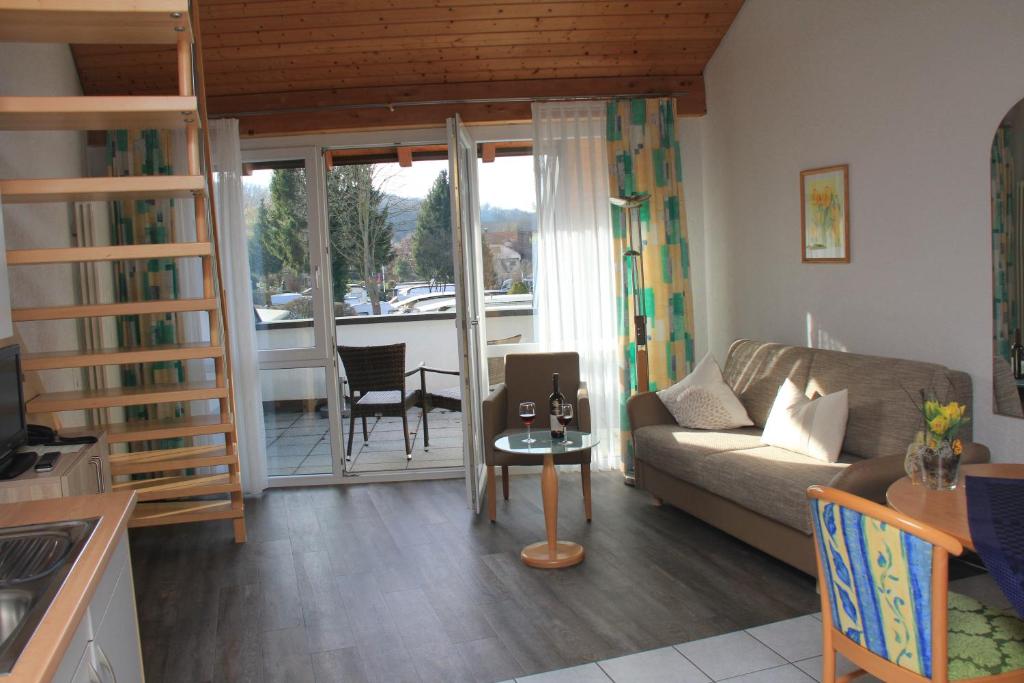 Posezení v ubytování Lug ins Land Restaurant & Ferienwohnungen