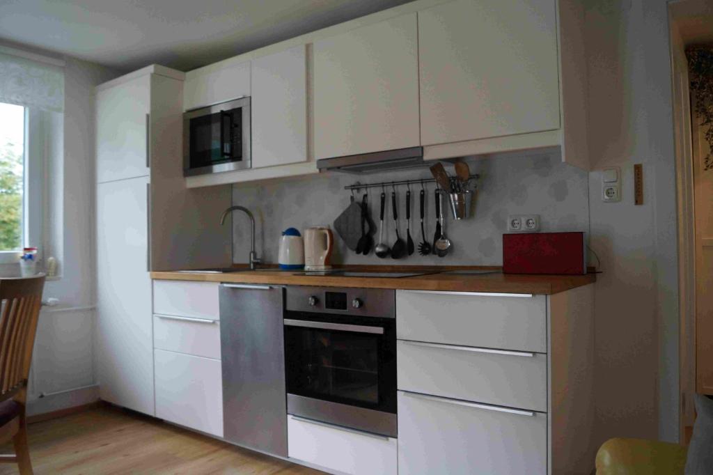 Kuchyňa alebo kuchynka v ubytovaní Apartment 14 Edelweiss Gosau
