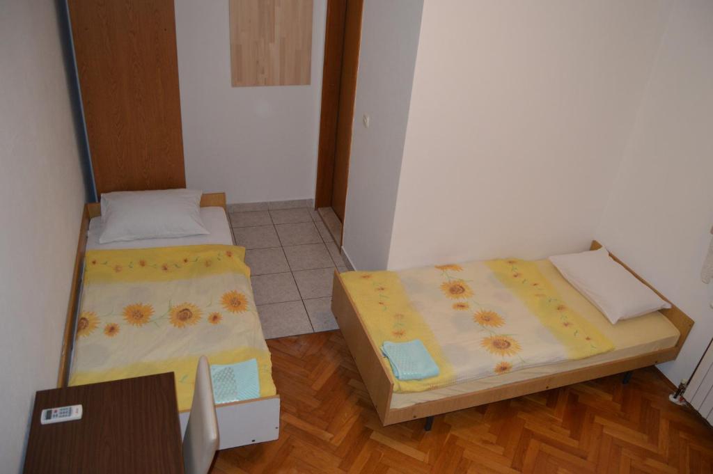 Postel nebo postele na pokoji v ubytování Pansion Modana Medjugorje