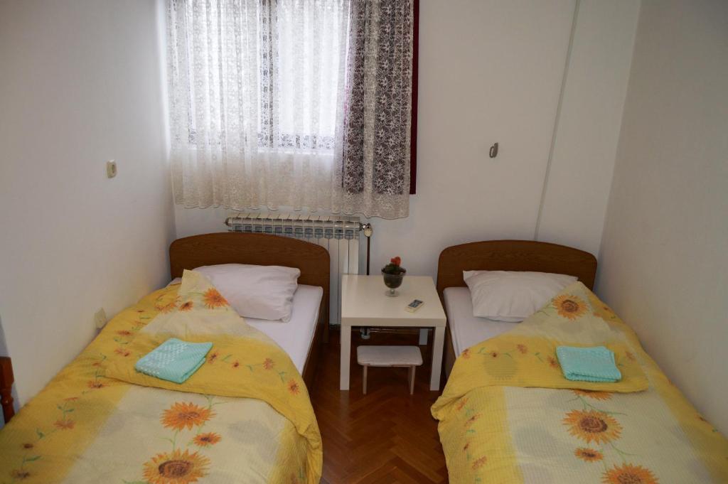 Postel nebo postele na pokoji v ubytování Pansion Modana Medjugorje