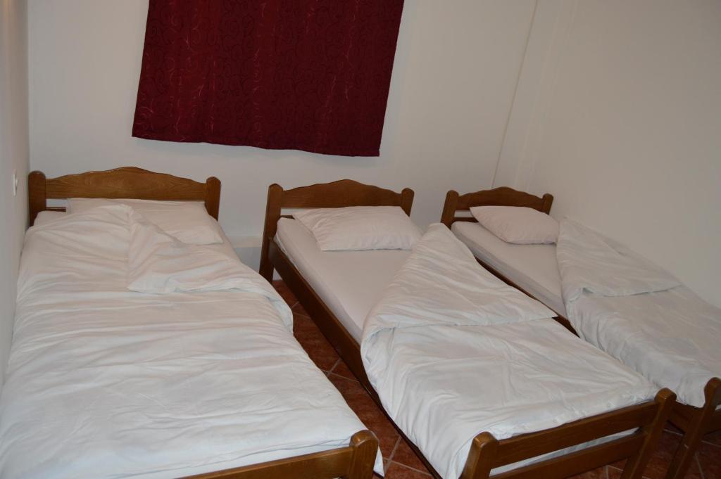 Postel nebo postele na pokoji v ubytování Pansion Modana Medjugorje
