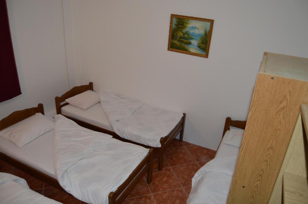 Postel nebo postele na pokoji v ubytování Pansion Modana Medjugorje