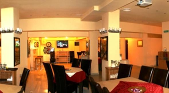 TV a/nebo společenská místnost v ubytování Hotel Austin