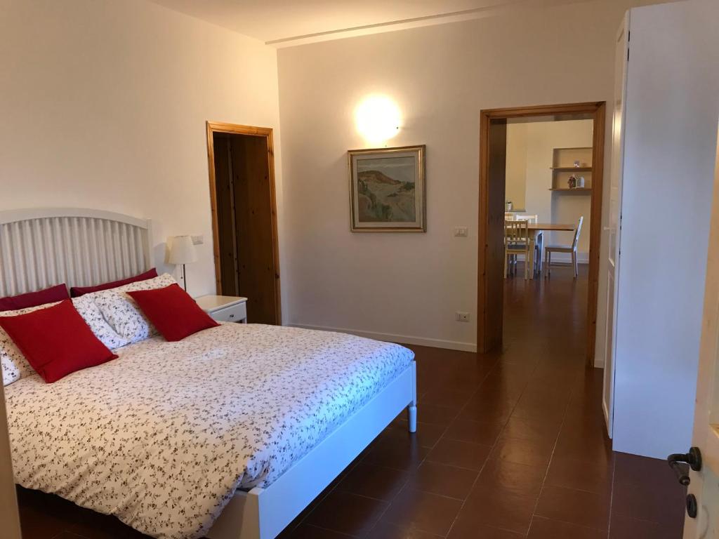 Postel nebo postele na pokoji v ubytování Chalet Delle Rose Saludecio