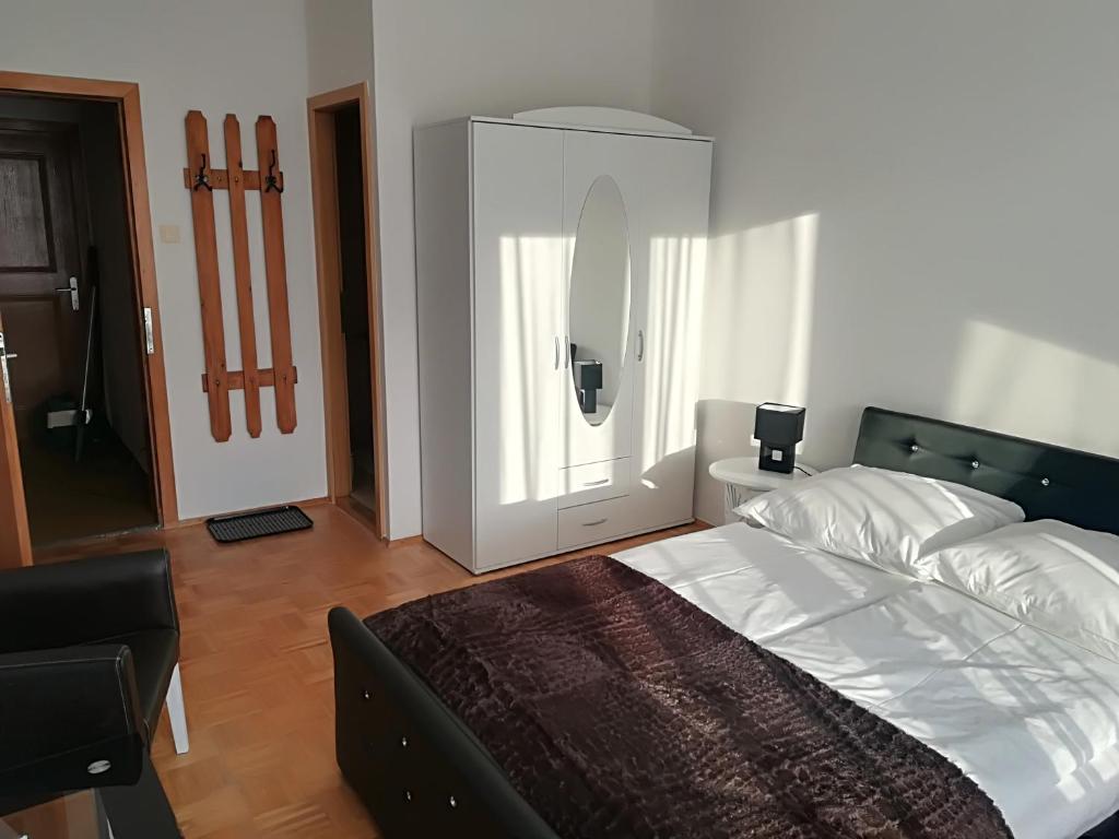 Postel nebo postele na pokoji v ubytování Privatzimmer Dimitrova